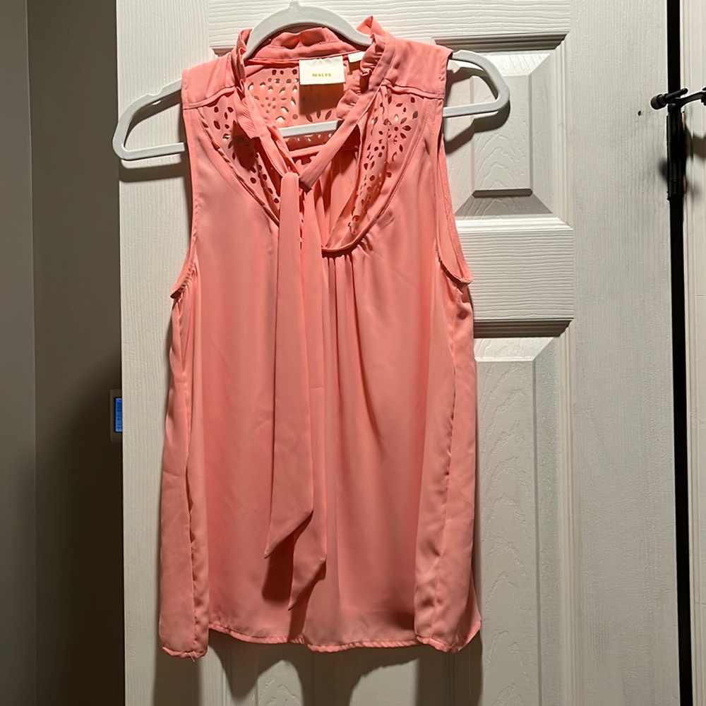Pink cut out sleeveless blouse